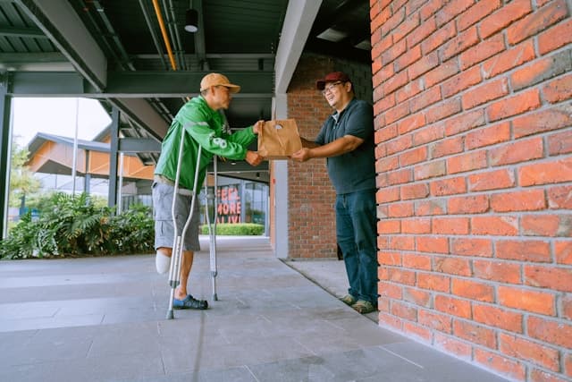 Man in crotches making delivery